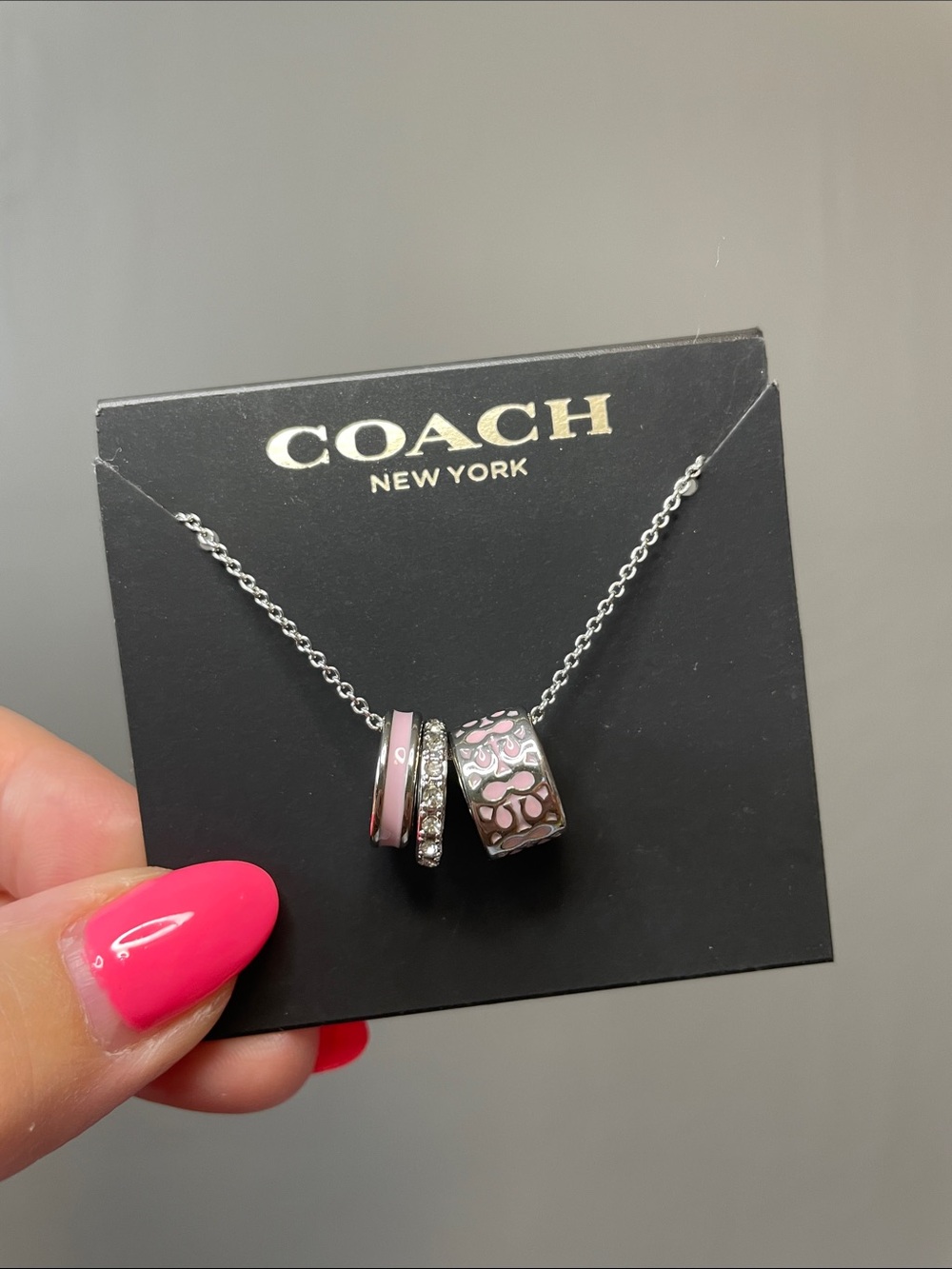 COACH Silver Necklace with Pink Enamel & Crystal Ring Charms $128 MSRP NWT - Picture 2 of 7